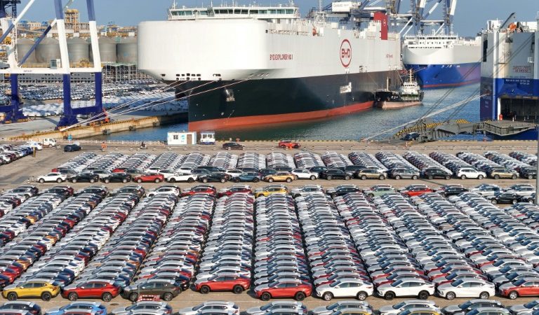 Electric cars waiting to be loaded onto a vessel in China to be transported